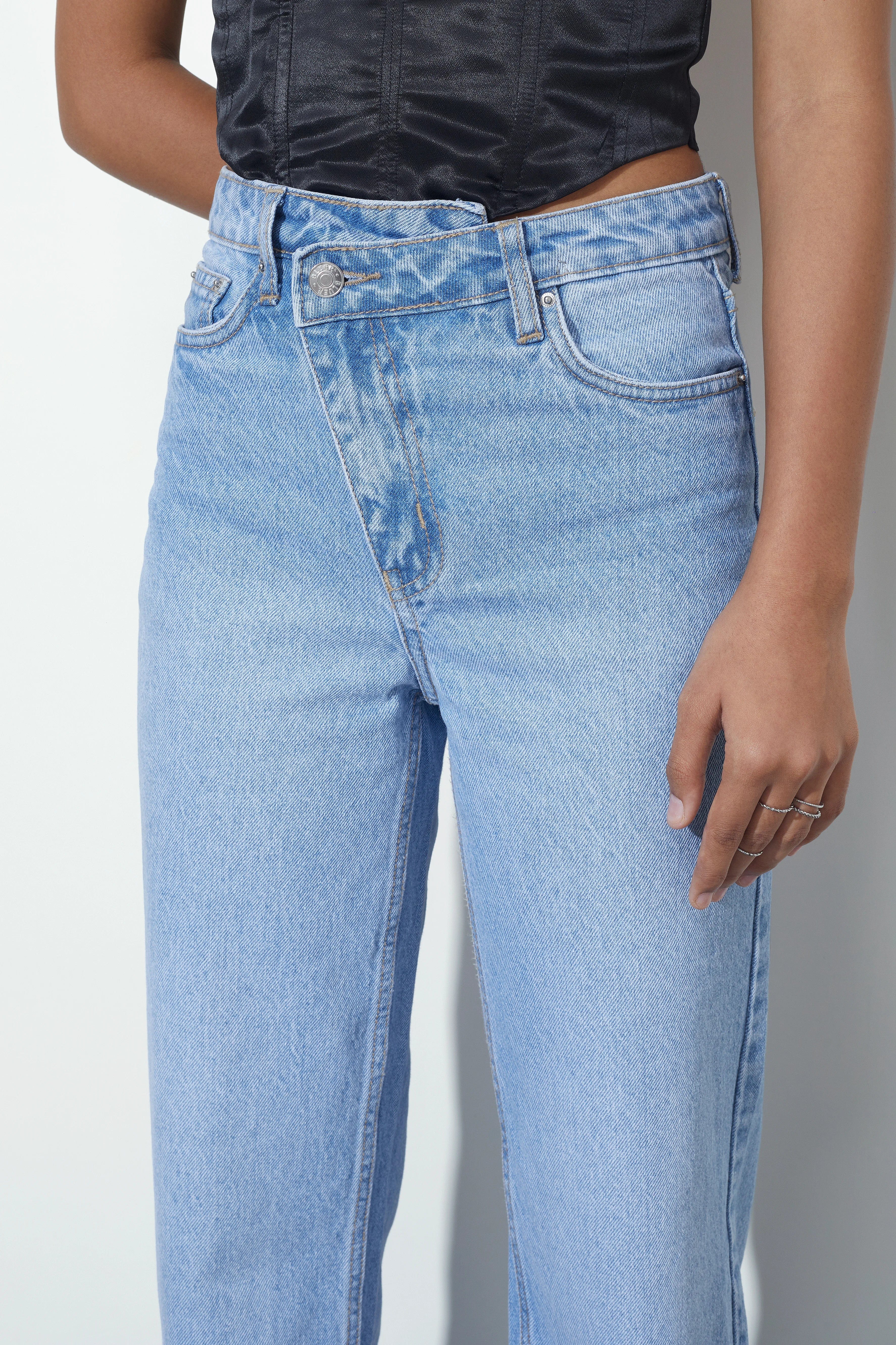 Asymmetrical jeans best sale